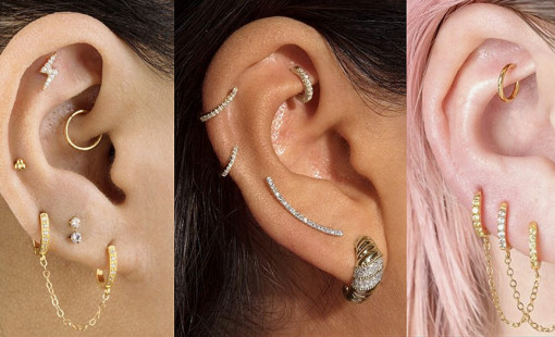 Ears pierced and adorned with stud earrings and ear cuffs. 